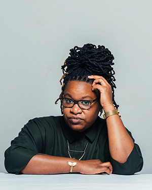 Photo of Nataleah Hunter-Young leaning on a table.