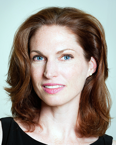 Headshot of Sandra Smeltzer in a black tank top.