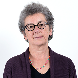 Headshot of Mariana Valverde in a burgundy cardigan and wearing glasses. 