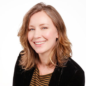 Headshot of Alissa Centivany in a striped shirt and dark blazer.