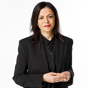 Nahlah Ayed wearing a dark blazer.